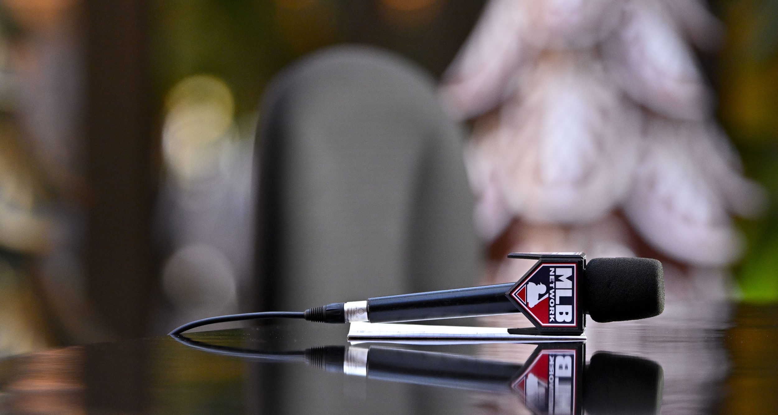 Dec 11, 2024; Dallas, TX, USA; A view an MLB Network microphone and Christmas decorations during the 2024 MLB Winter Meetings at the Hilton Anatole. Mandatory Credit: Jerome Miron-Imagn Images