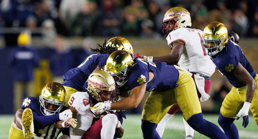 Notre Dame's defense takes down Florida State running back Lawrance Toafili (9) during a NCAA college football game at Notre Dame Stadium on Saturday, Nov. 9, 2024, in South Bend.