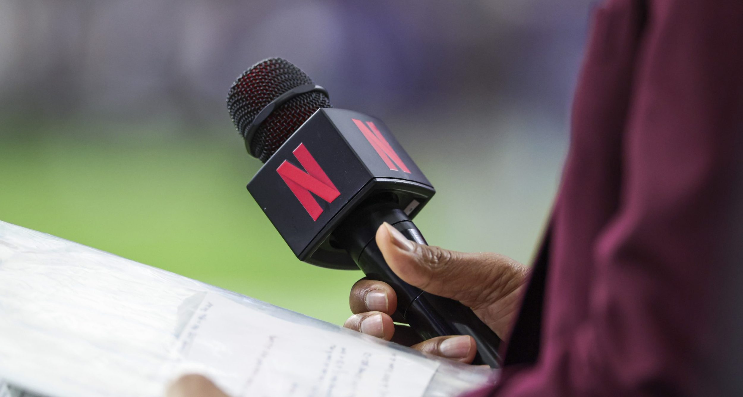 Dec 15, 2024; Houston, Texas, USA; General view of a Netflix microphone held by sideline reporter Steve Wyche before the game between the Houston Texans and the Baltimore Ravens at NRG Stadium. Mandatory Credit: Troy Taormina-Imagn Images