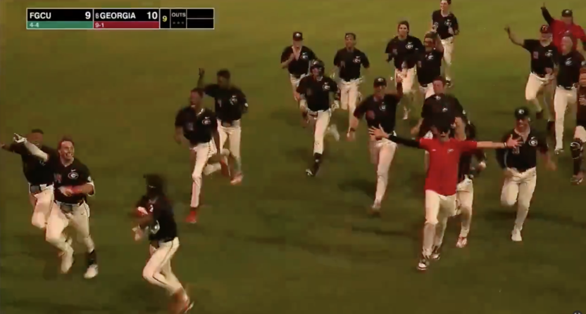Georgia celebrating a walk-off win against Florida Gulf Coast