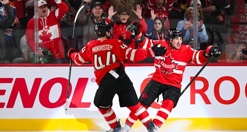 Feb 12, 2025; Montreal, Quebec, CAN; [Imagn Images direct customers only] Team Canada forward Brad Marchand (63) celebrates with defenseman Josh Morrissey (44) his goal against Team Sweden in the first period during a 4 Nations Face-Off ice hockey game at Bell Centre. Mandatory Credit: David Kirouac-Imagn Images