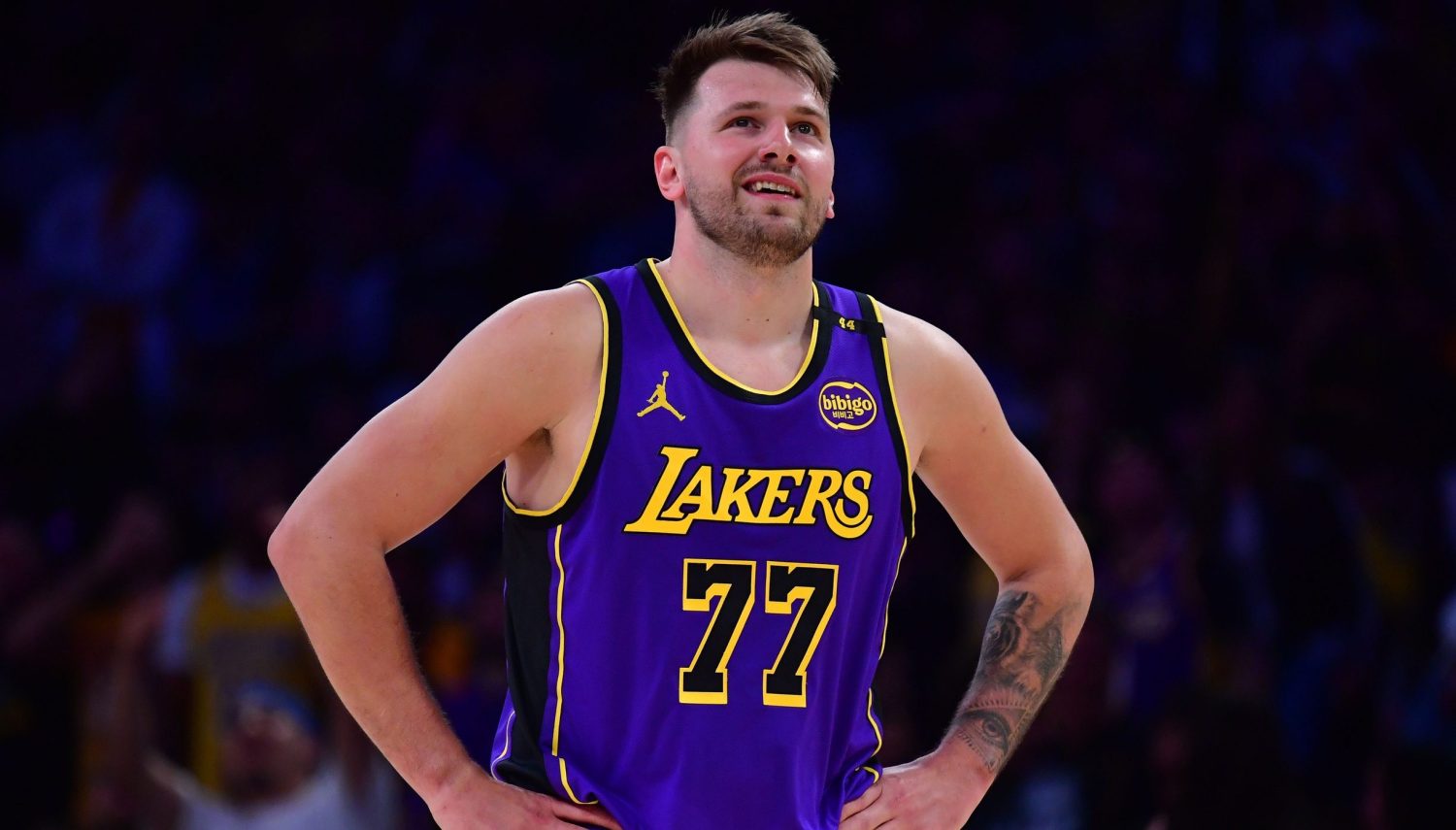 Feb 25, 2025; Los Angeles, California, USA; Los Angeles Lakers guard Luka Doncic (77) reacts against the Dallas Mavericks during the first quarter at Crypto.com Arena. Mandatory Credit: Gary A. Vasquez-Imagn Images