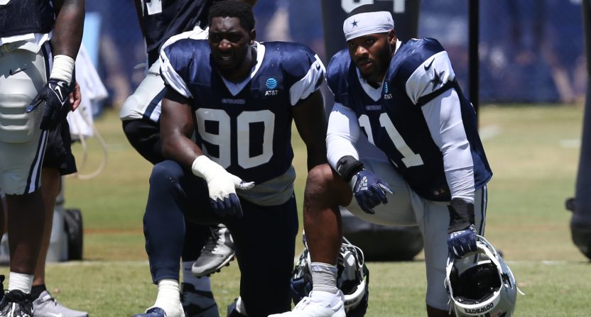 Jul 30, 2024; Oxnard, CA, USA; Dallas Cowboys defensive end DeMarcus Lawrence (90) and linebacker Micah Parsons (11) during training camp at the River Ridge Playing Fields in Oxnard, California. Mandatory Credit: Jason Parkhurst-USA TODAY Sports