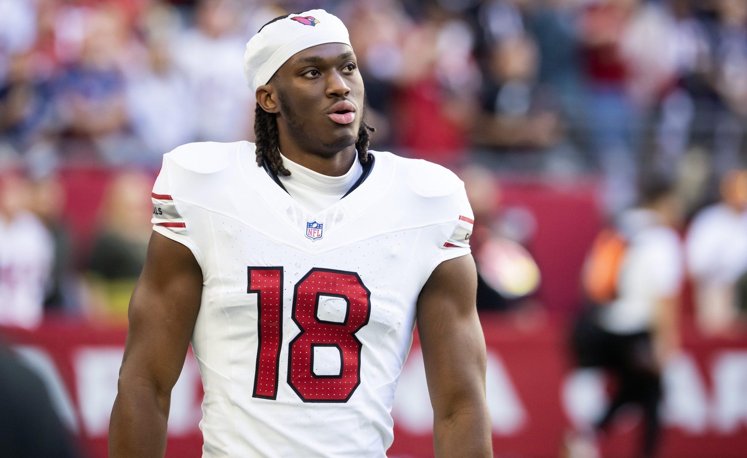 Dec 15, 2024; Glendale, Arizona, USA; Arizona Cardinals wide receiver Marvin Harrison Jr. (18) against the New England Patriots at State Farm Stadium. Mandatory Credit: Mark J. Rebilas-Imagn Images