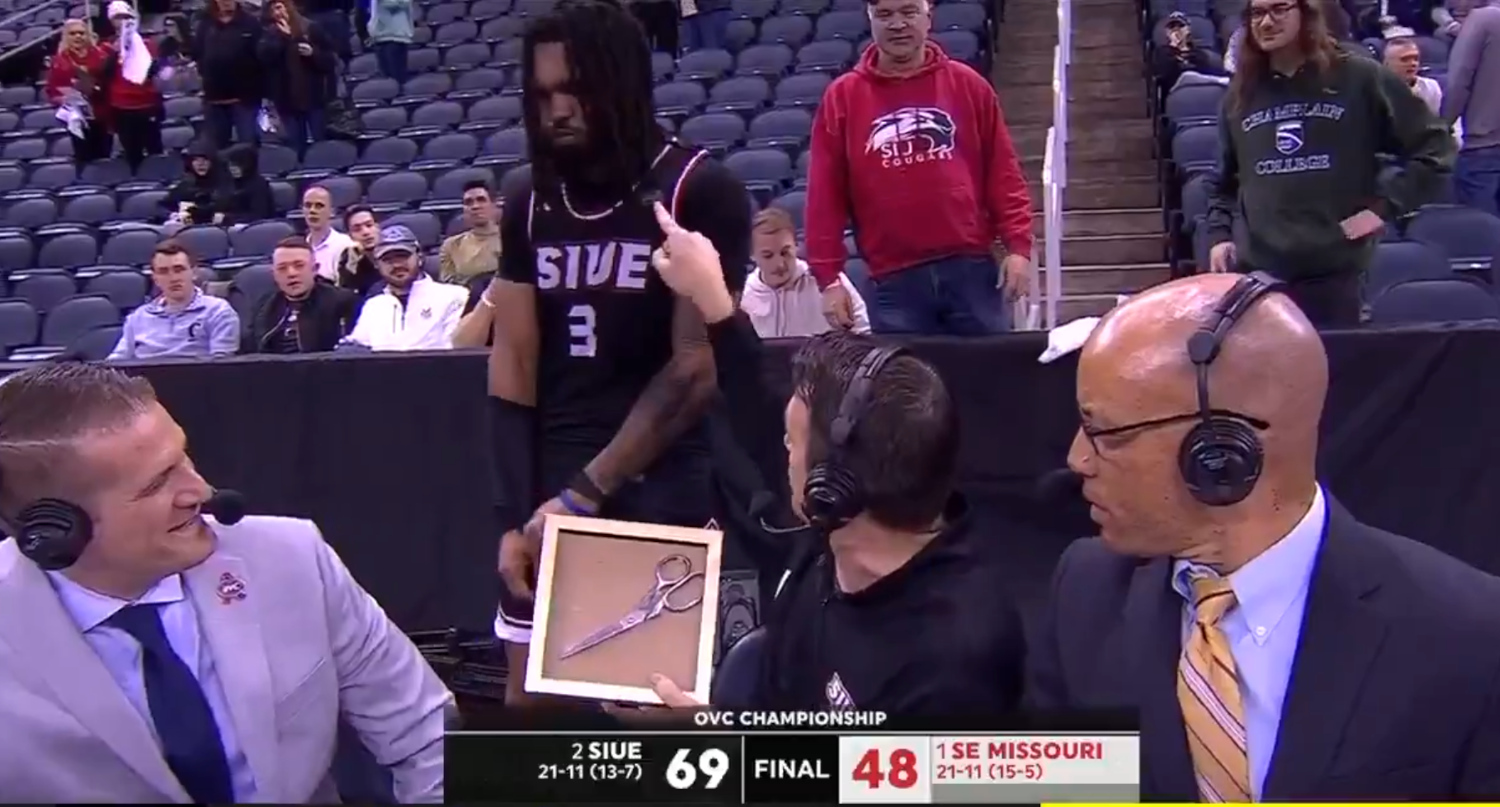 Coach Brian Barone celebrated SIUE’s first-ever NCAA Tournament berth with framed scissors