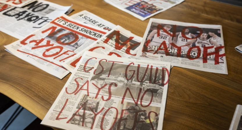 The Chicago Sun-Times Guild protesting potential layoffs, which led to buyouts.