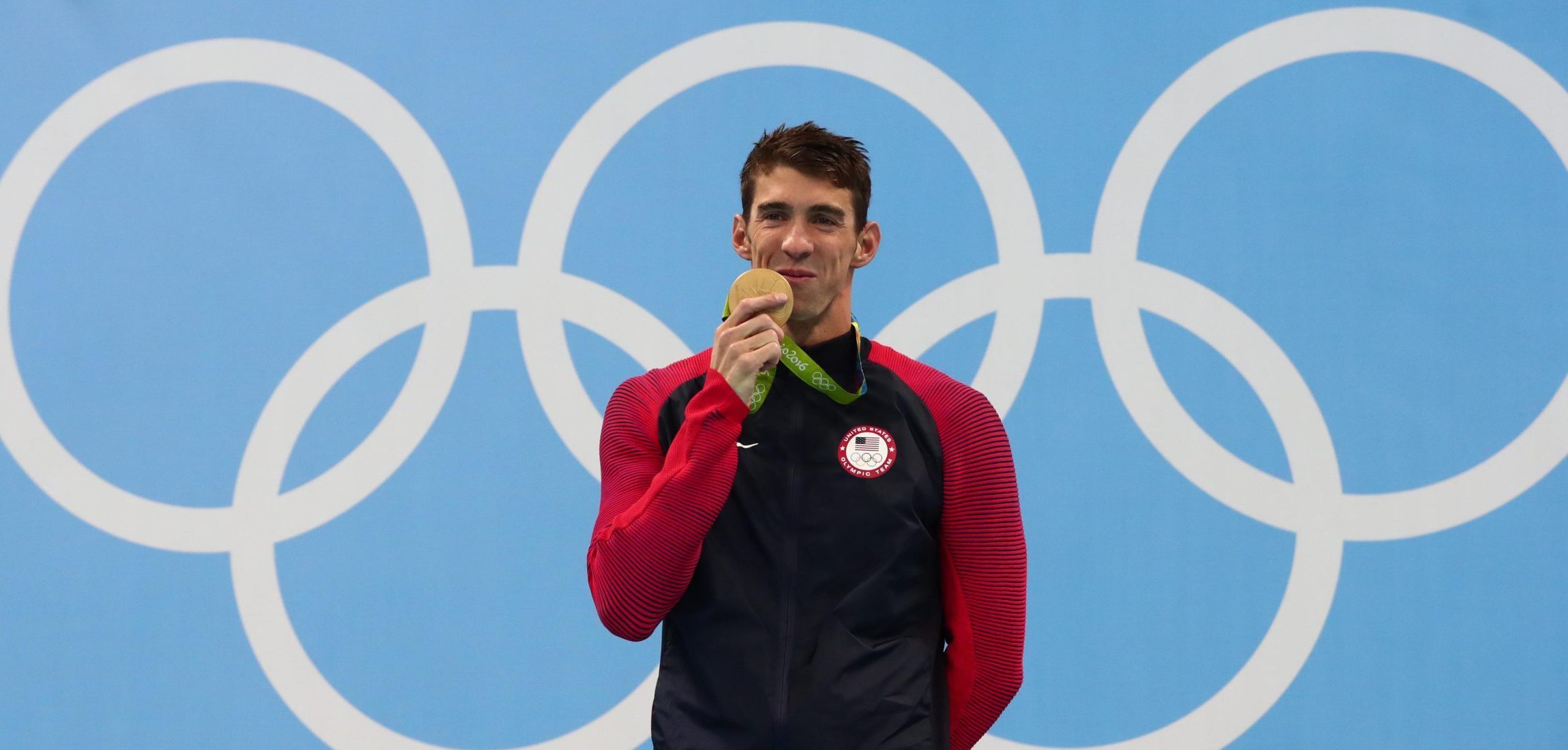 Michael Phelps (USA) with his gold medal after the men's 200m individual medley final in the Rio 2016 Summer Olympic Games at Olympic Aquatics Stadium.