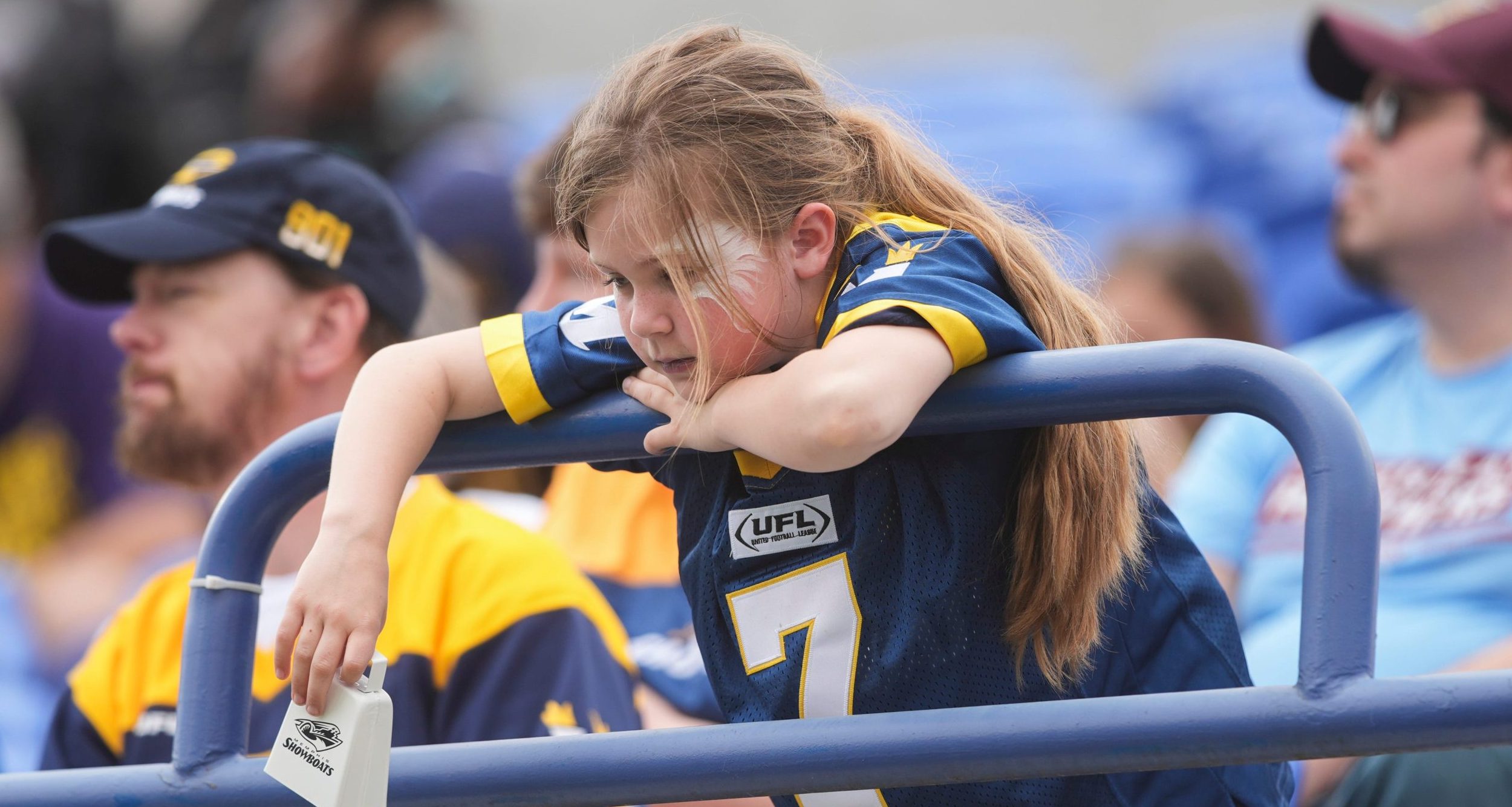A young Showboats fan looks on during the UFL game