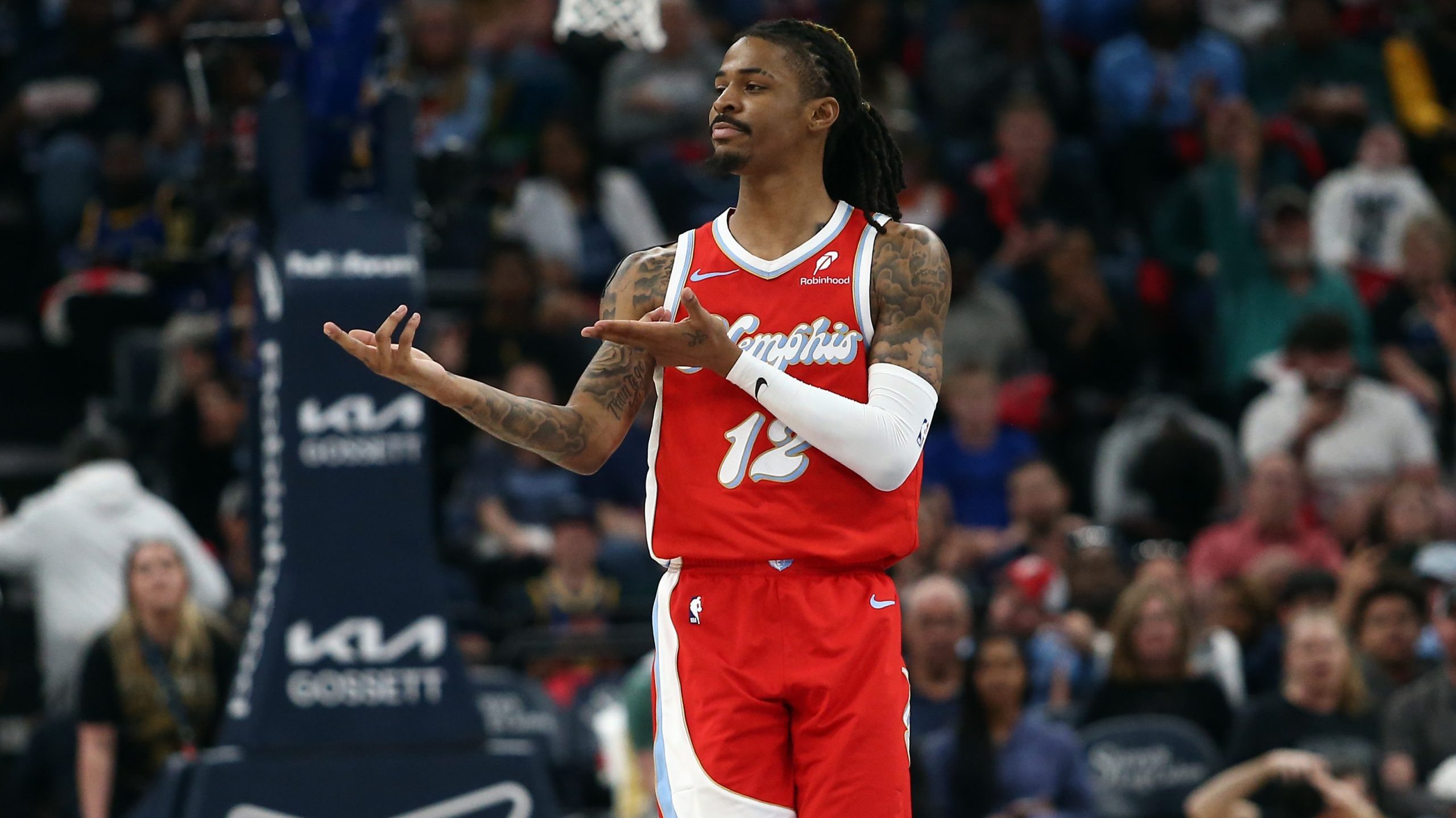 Apr 1, 2025; Memphis, Tennessee, USA; Memphis Grizzlies guard Ja Morant (12) reacts after a basket during the second quarter against the Golden State Warriors at FedExForum. Mandatory Credit: Petre Thomas-Imagn Images