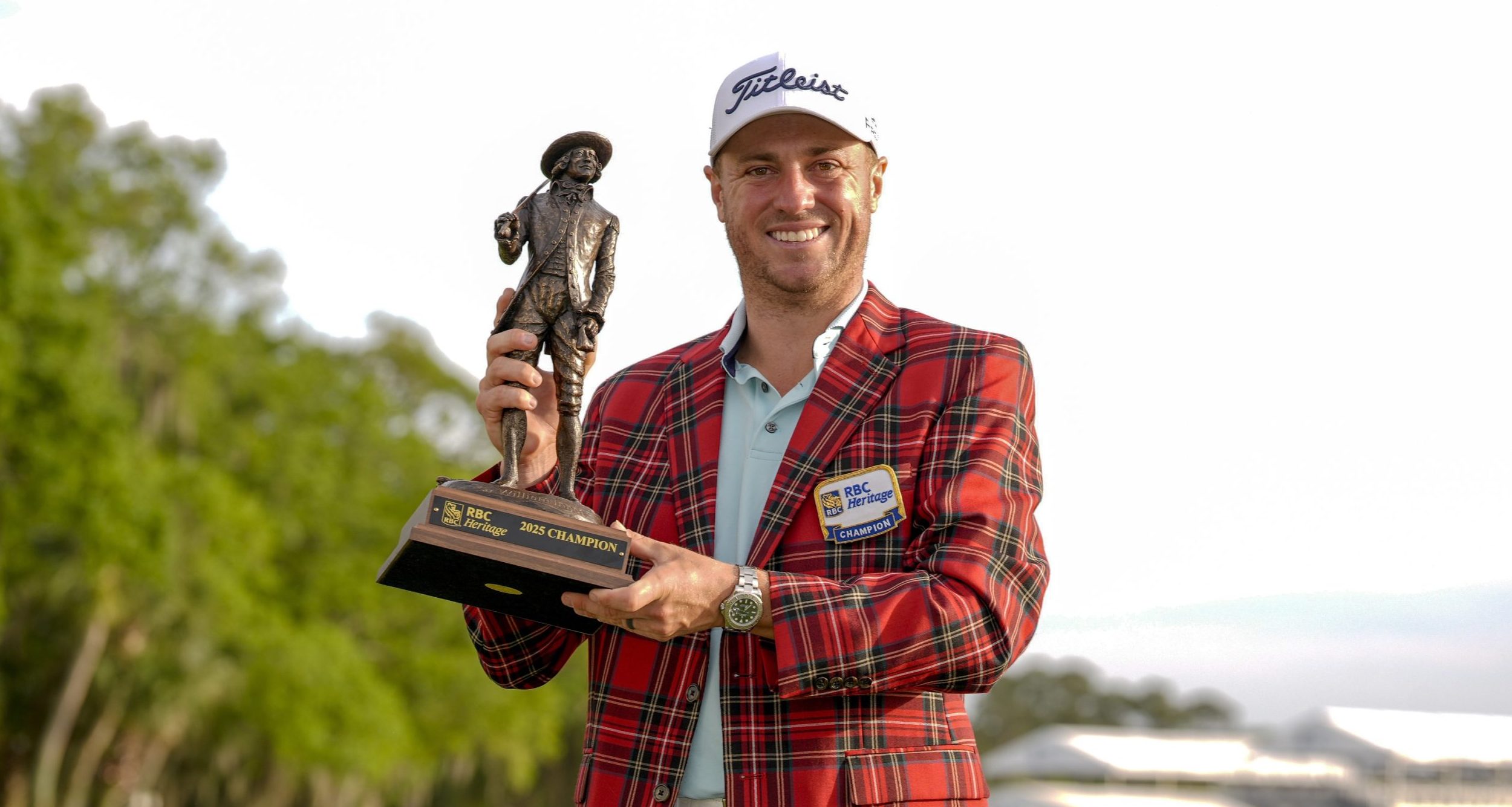 Justin Thomas holds the winners trophy during the final round of the RBC Heritage