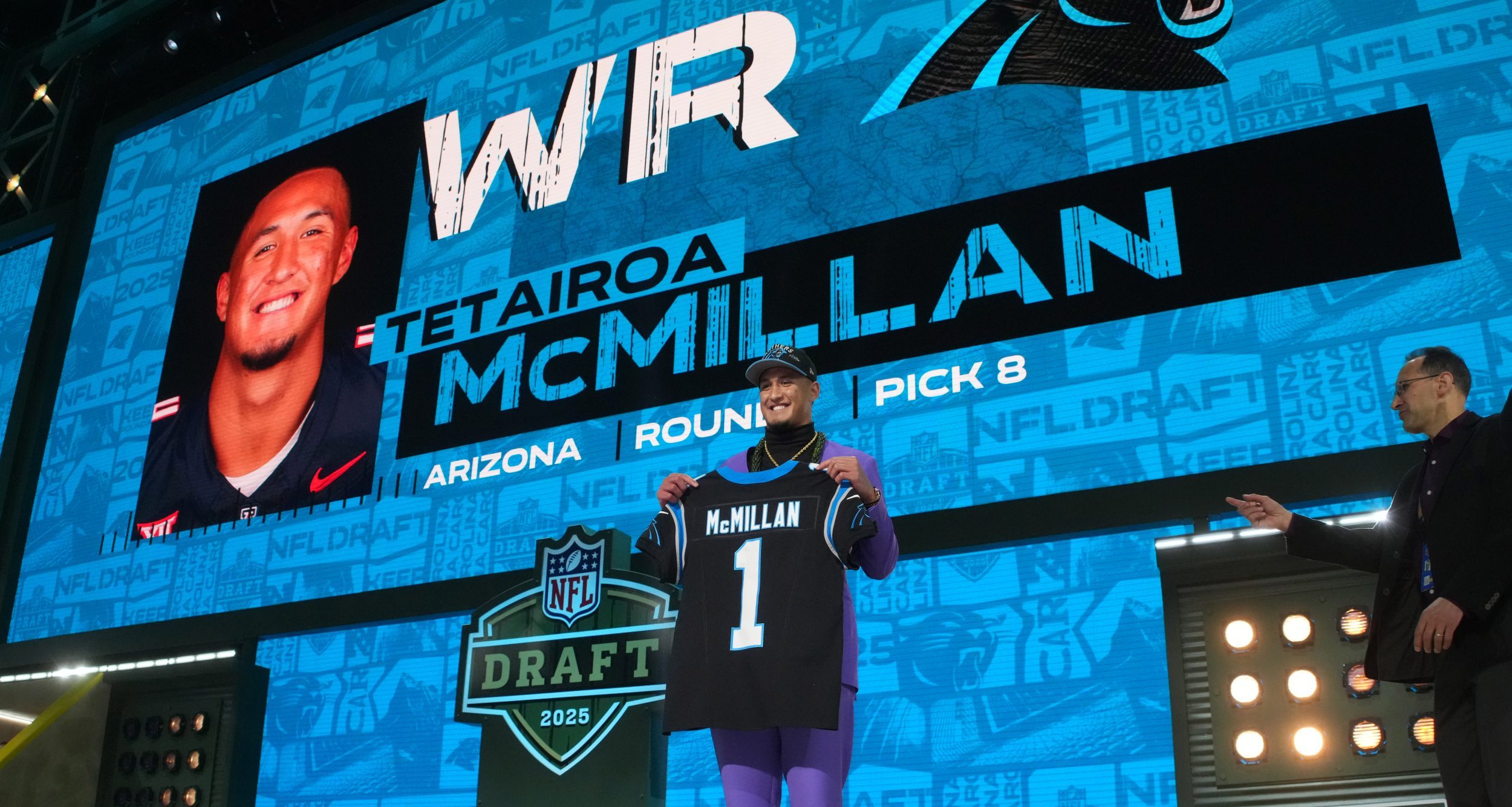 Apr 24, 2025; Green Bay, WI, USA; Arizona Wildcats wide receiver Tetairoa McMillan is selected by the Carolina Panthers as the number eight pick in the first round of the 2025 NFL Draft at Lambeau Field.