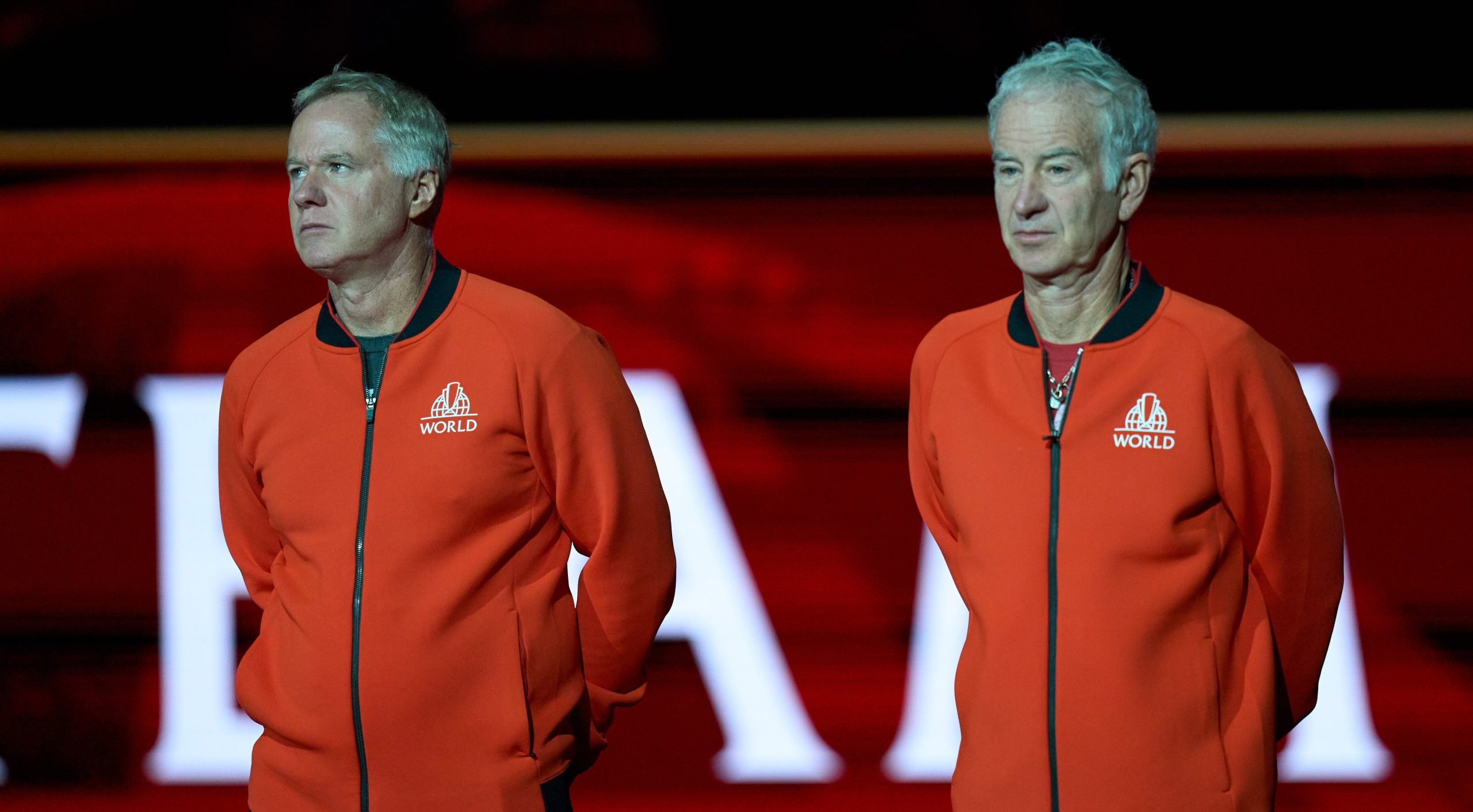 John McEnroe alongside his brother and fellow broadcaster Patrick McEnroe