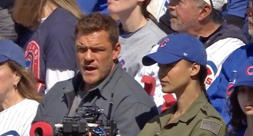 Stars of the show 'Reacher' filming for the show during a Cubs-Marlins game