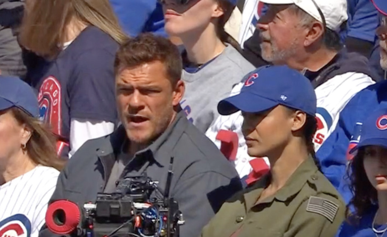 Stars of the show 'Reacher' filming for the show during a Cubs-Marlins game