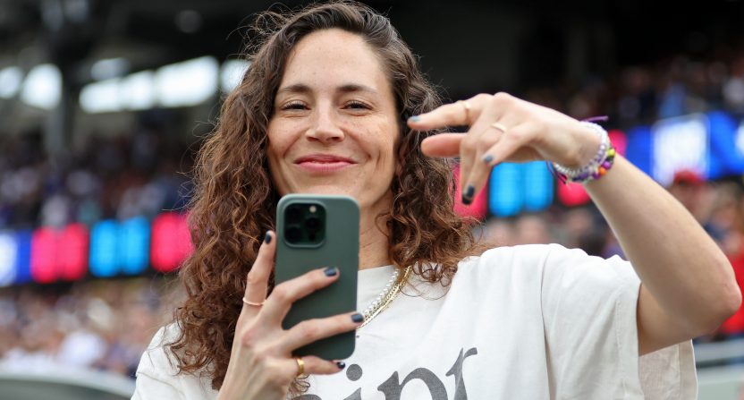 Sep 24, 2023; Chicago, Illinois, USA; Sue Bird reacts as she takes a photo before the game between the United States and South Africa at Soldier Field. Mandatory Credit: Jon Durr-USA TODAY Sports