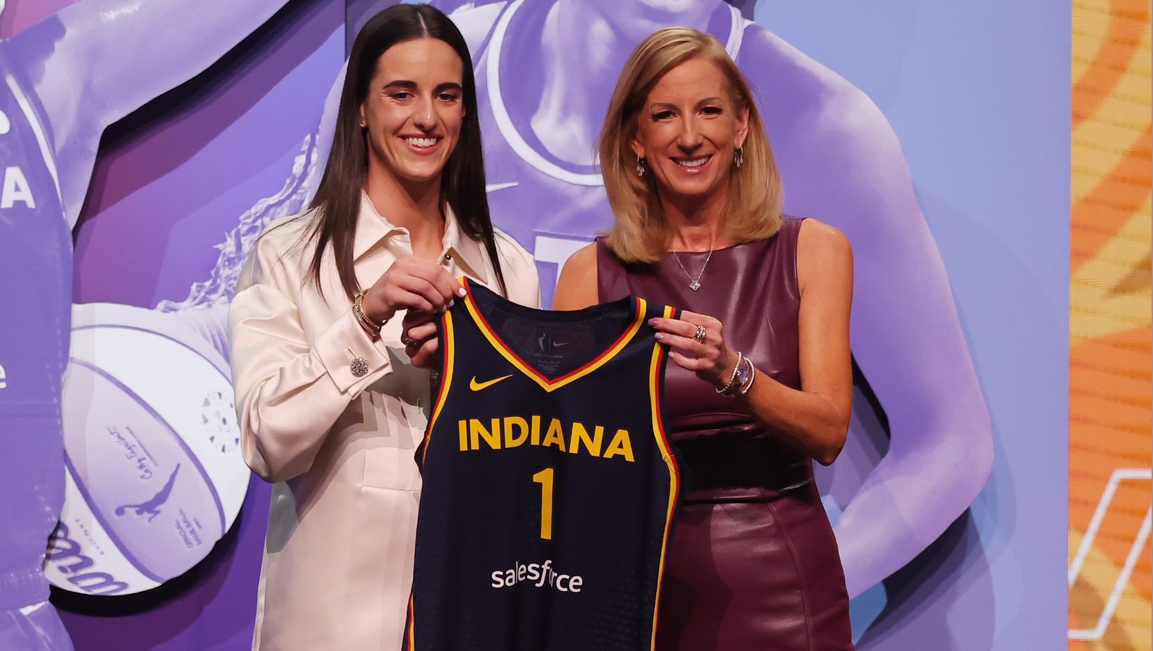 Apr 15, 2024; Brooklyn, NY, USA; Caitlin Clark poses with WNBA commissioner Cathy Engelbert after she is selected with the number one overall pick to the Indiana Fever in the 2024 WNBA Draft at Brooklyn Academy of Music. Mandatory Credit: Brad Penner-USA TODAY Sports