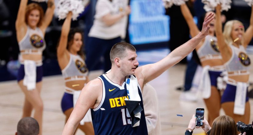 Apr 29, 2024; Denver, Colorado, USA; Denver Nuggets center Nikola Jokic (15) waves after the game against the Los Angeles Lakers in game five of the first round for the 2024 NBA playoffs at Ball Arena.