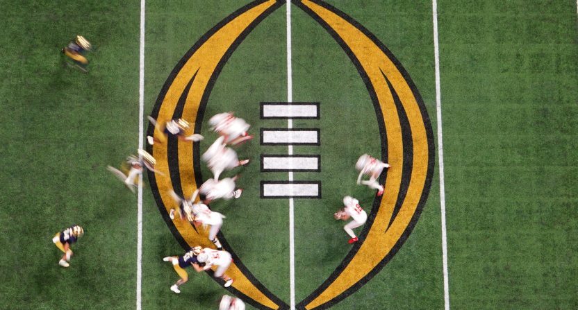 Jan 20, 2025; Atlanta, GA, USA; Ohio State Buckeyes quarterback Will Howard (18) prepares to hand off the ball during the third quarter against the Notre Dame Fighting Irish in the College Football Playoff National Championship game at Mercedes-Benz Stadium. Mandatory Credit: James Lang-Imagn Images