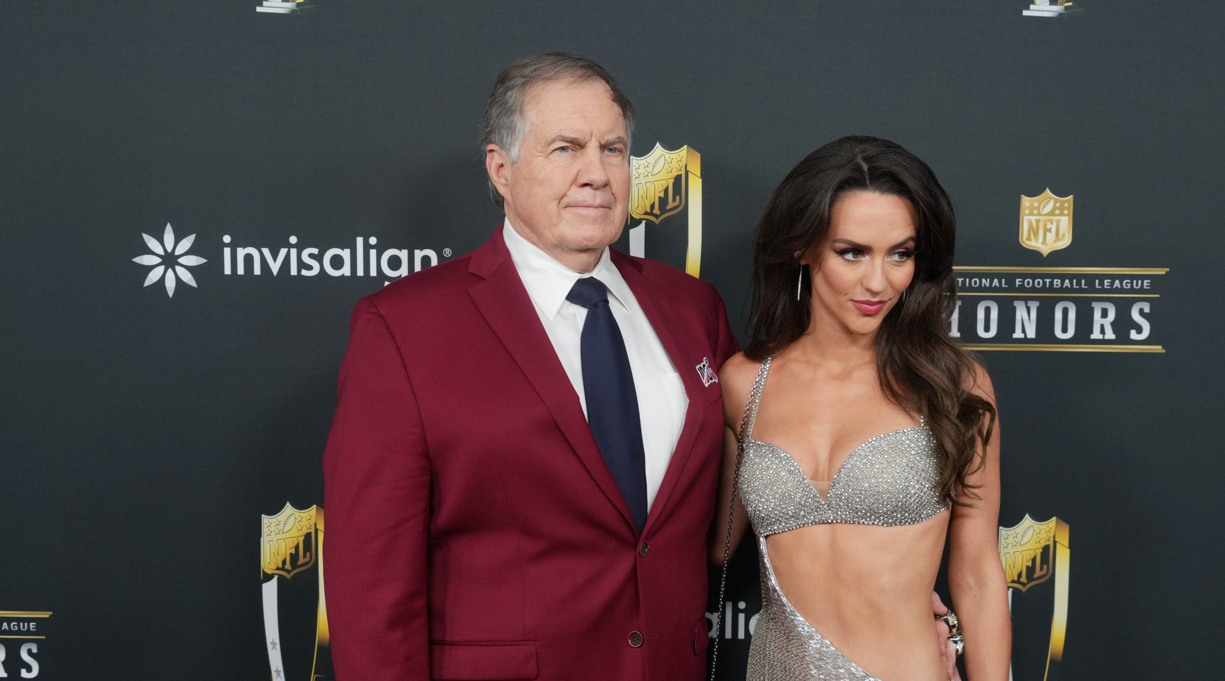 Bill Belichick and Jordon Hudson on the red carpet before Super Bowl LIX NFL Honors at Saenger Theatre.
