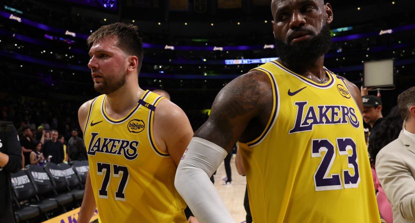 Apr 22, 2025; Los Angeles, California, USA; Los Angeles Lakers guard Luka Doncic (77) and Los Angeles Lakers forward LeBron James (23) leave a court after defeating the Minnesota Timberwolves 94-85 in game two of first round for the 2024 NBA Playoffs at Crypto.com Arena. Mandatory Credit: Kiyoshi Mio-Imagn Images