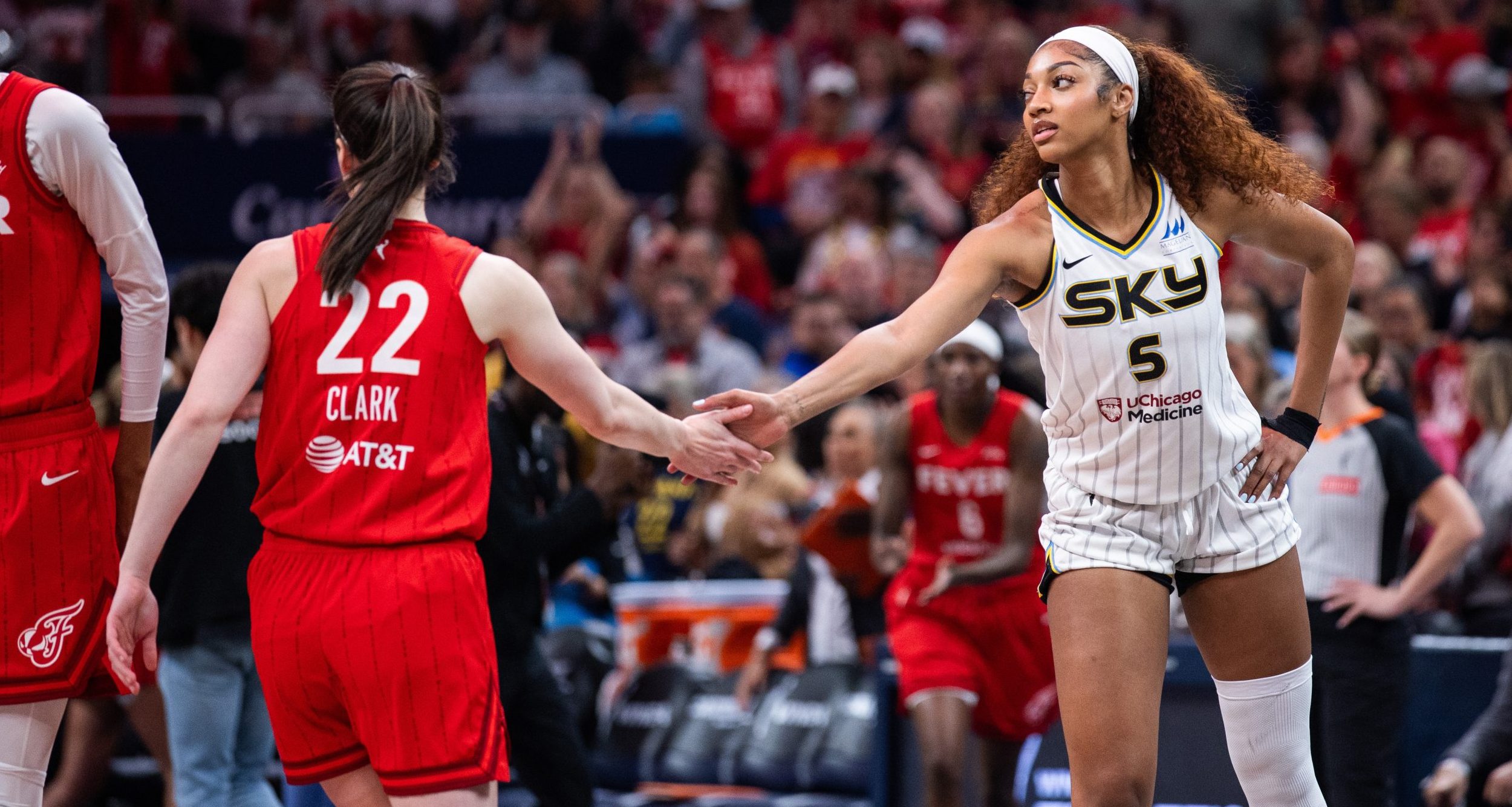 Indiana Fever guard Caitlin Clark (22) and Chicago Sky forward Angel Reese