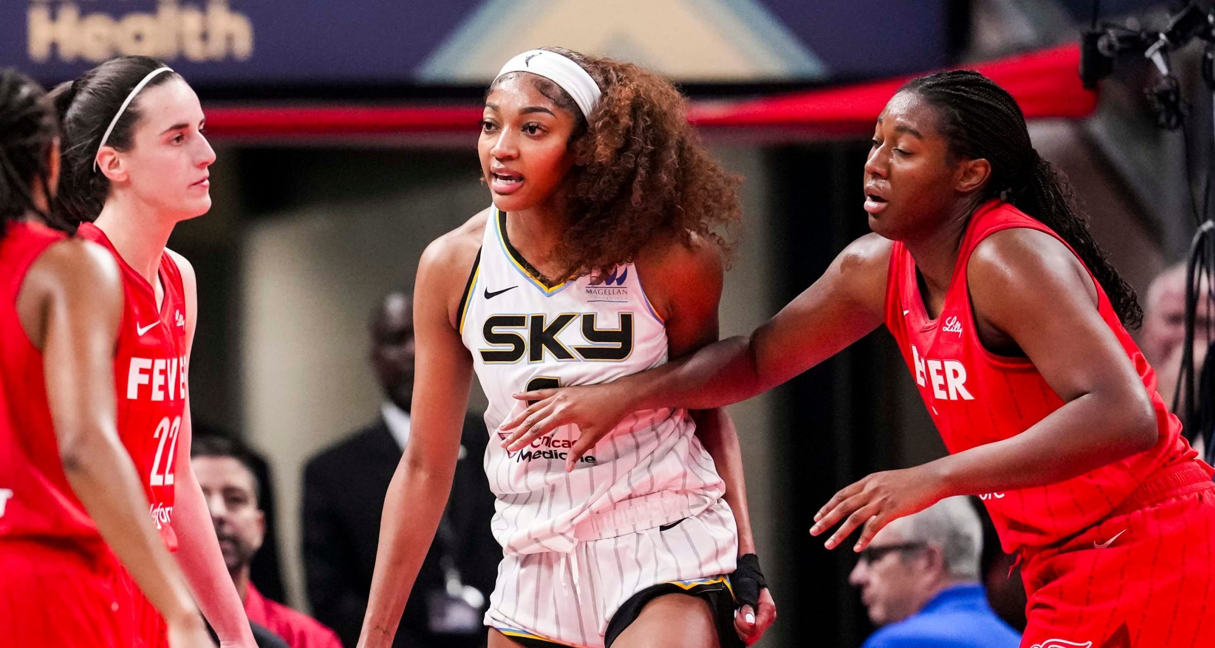 Chicago Sky forward Angel Reese (5) reacts to a flagrant foul from Indiana Fever guard Caitlin Clark