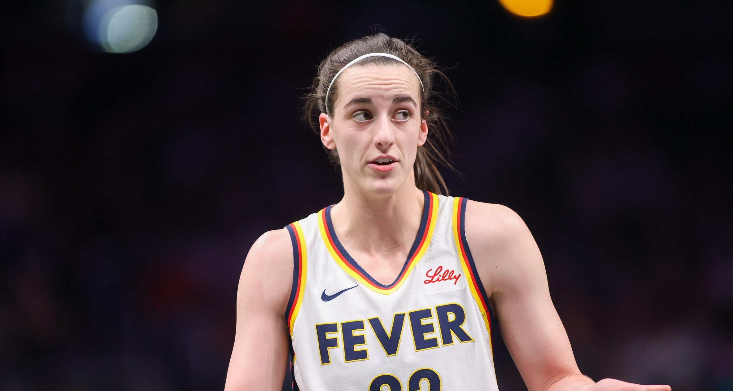 Indiana Fever guard Caitlin Clark (22) talks to a referee against the Atlanta Dream in the first half at State Farm Arena.