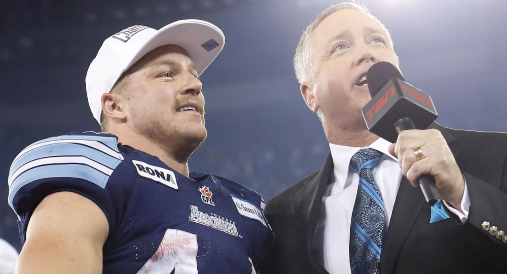 Matt Dunigan (R) with 2012 Grey Cup MVP Chad Kackert after that game.