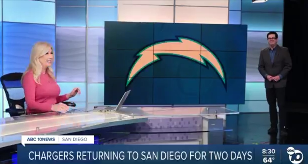 10News San Diego's Kimberly Hunt (L) and Ben Higgins discussing the Chargers' training camp return.
