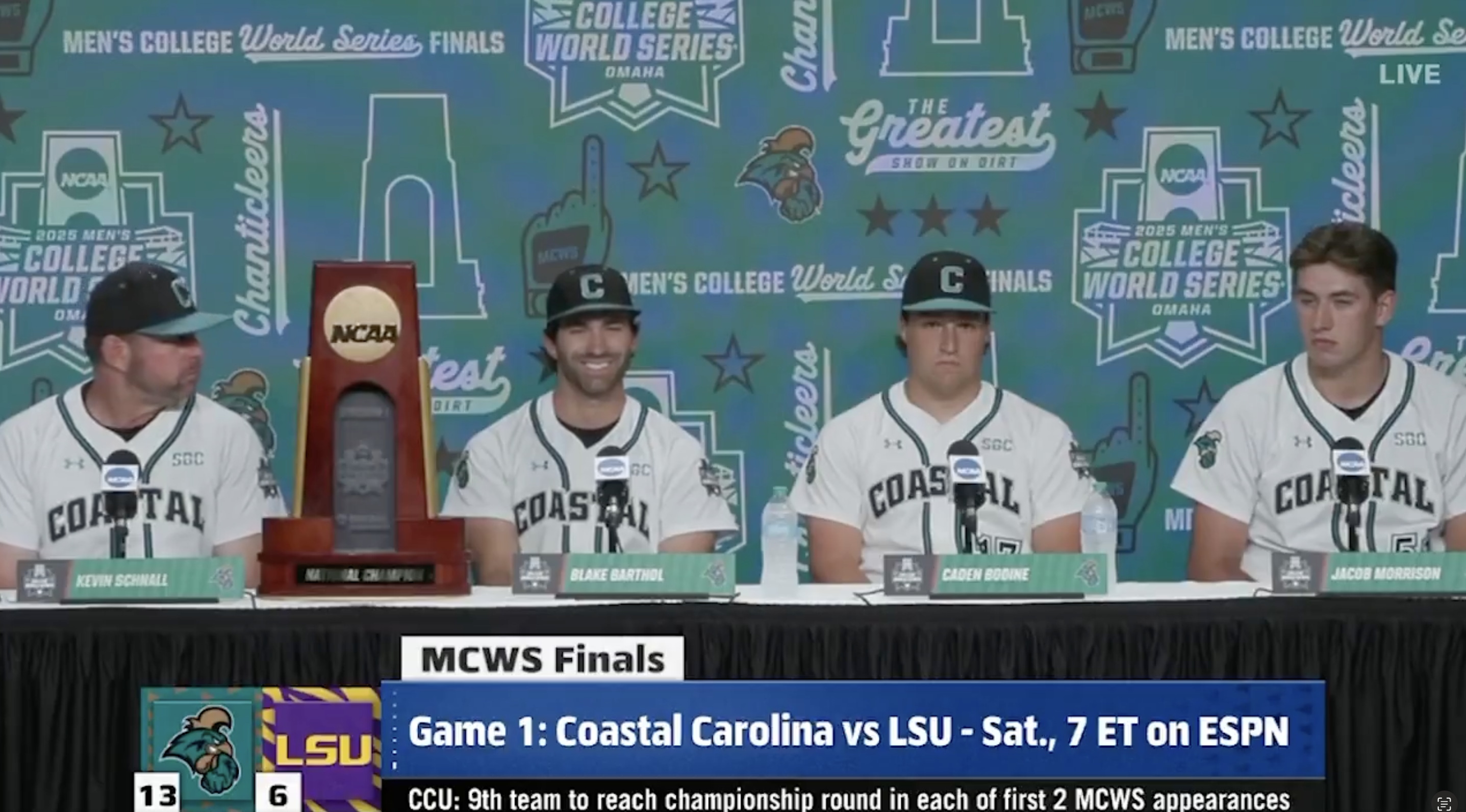Coastal Carolina players and head coach Kevin Schnall speaking to the media ahead of Game 1 of the College World Series Final