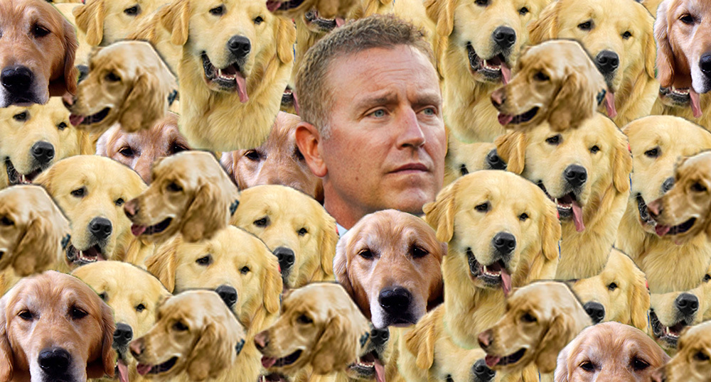 Kirk Herbstreit and golden retreivers