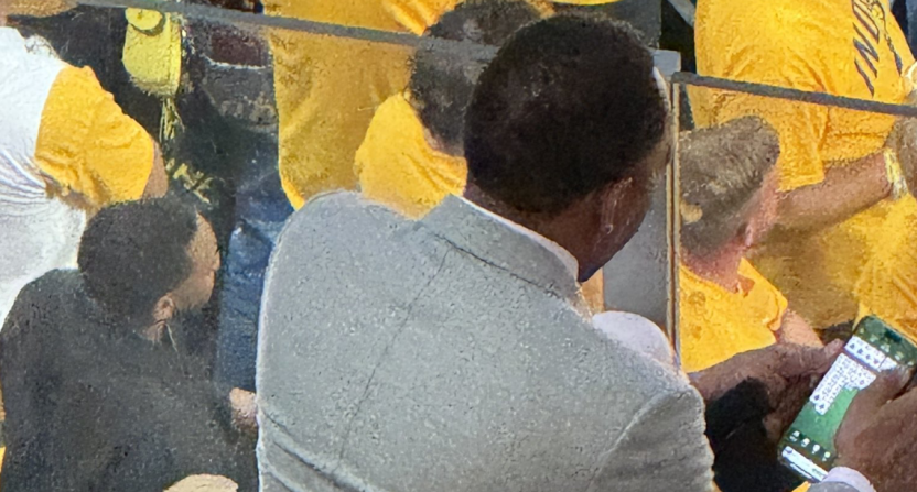 A photo from an Indiana Pacers fan of Stephen A. Smith on his phone during Game 4 of the 2025 NBA Finals