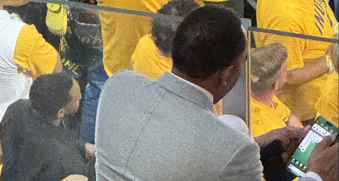 A photo from an Indiana Pacers fan of Stephen A. Smith on his phone during Game 4 of the 2025 NBA Finals