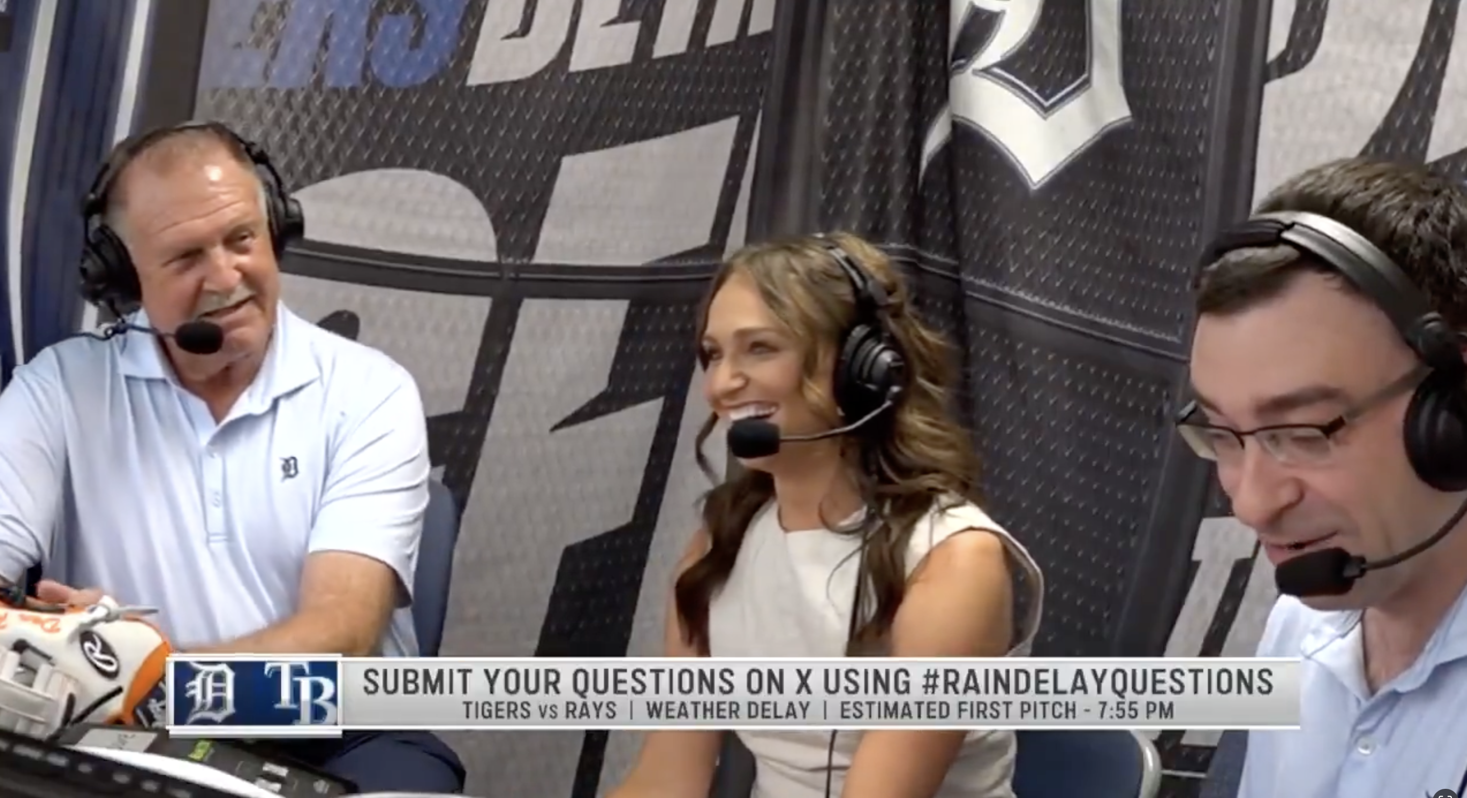 Tigers broadcasters discussing 'White Lotus' during a rain delay