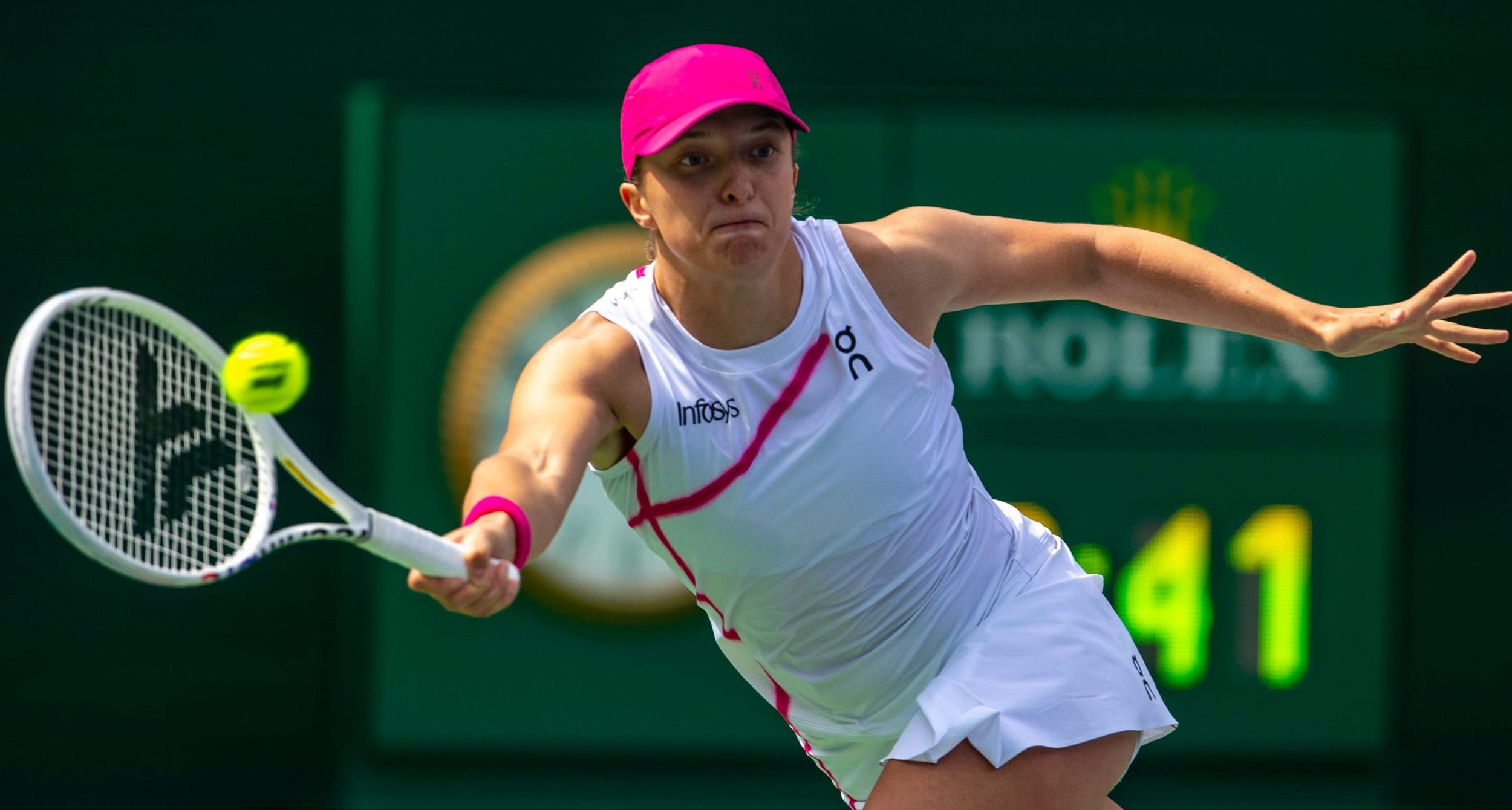 Iga Swiatek returns to Maria Sakkari during the WTA final of the BNP Paribas Open in Indian Wells