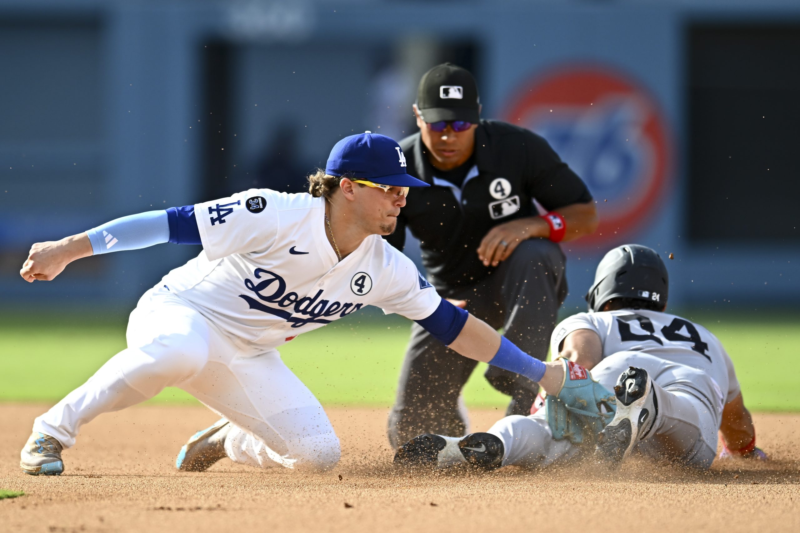 Jun 1, 2025; Los Angeles, California, USA; New York Yankees outfielder Jasson Domínguez (24) steals second base against Los Angeles Dodgers second baseman Enrique Hernández (8) during the fifth inning at Dodger Stadium. Mandatory Credit: Jonathan Hui-Imagn Images
