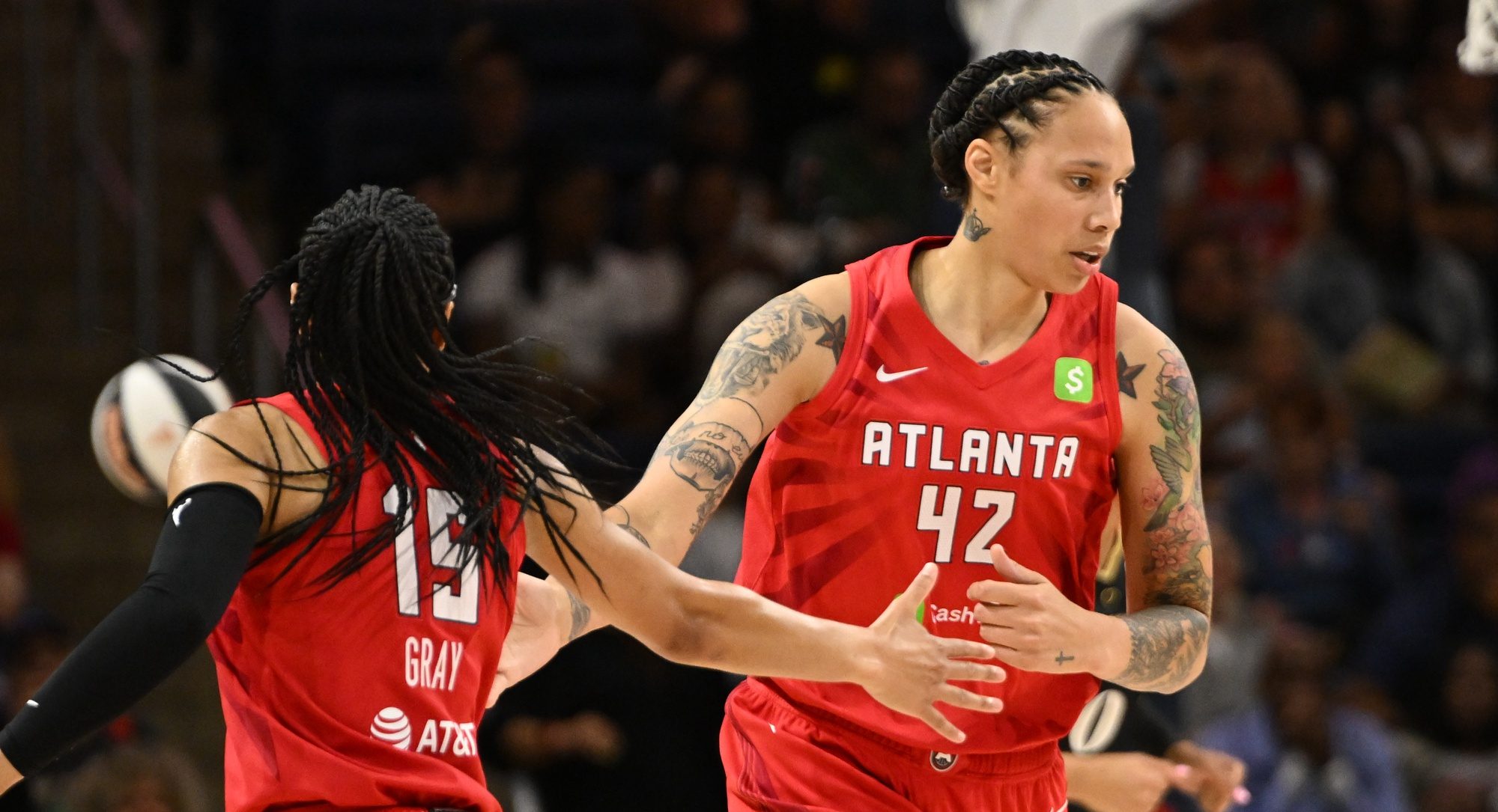 Atlanta Dream center Brittney Griner (42) celebrates a play with guard Allisha Gray (15) during the third quarter against the Washington Mystics at CareFirst Arena.