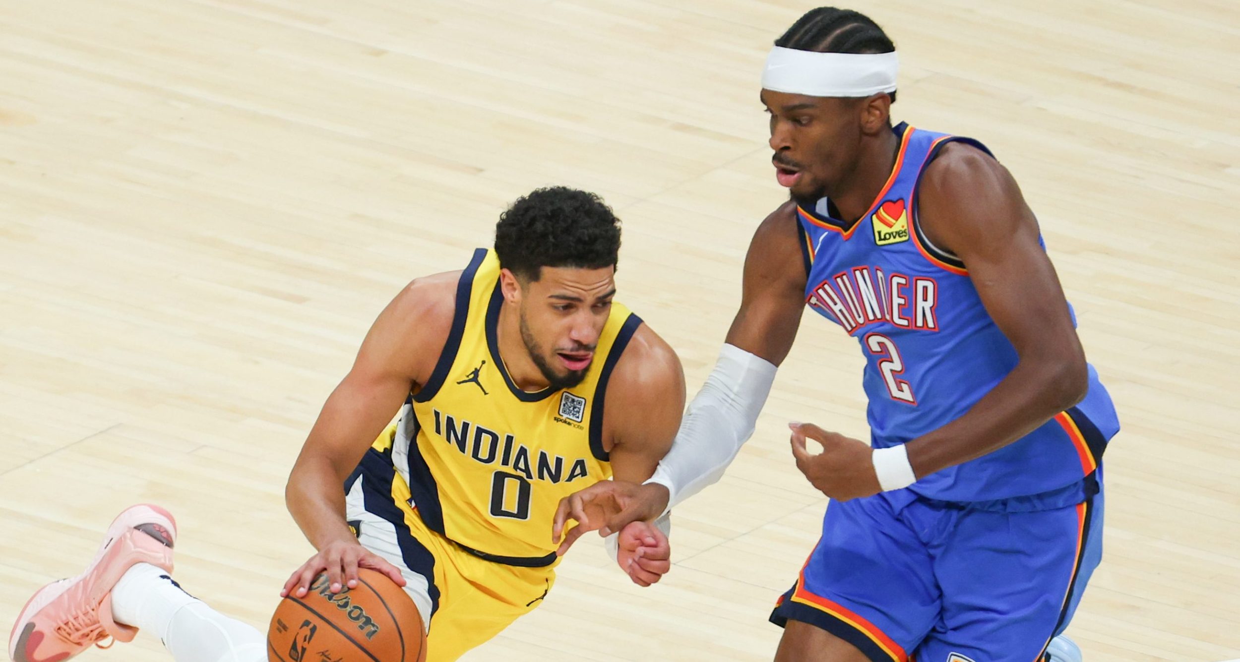 Indiana Pacers guard Tyrese Haliburton (0) drives to the basket against Oklahoma City Thunder guard Shai Gilgeous-Alexander Skip Bayless