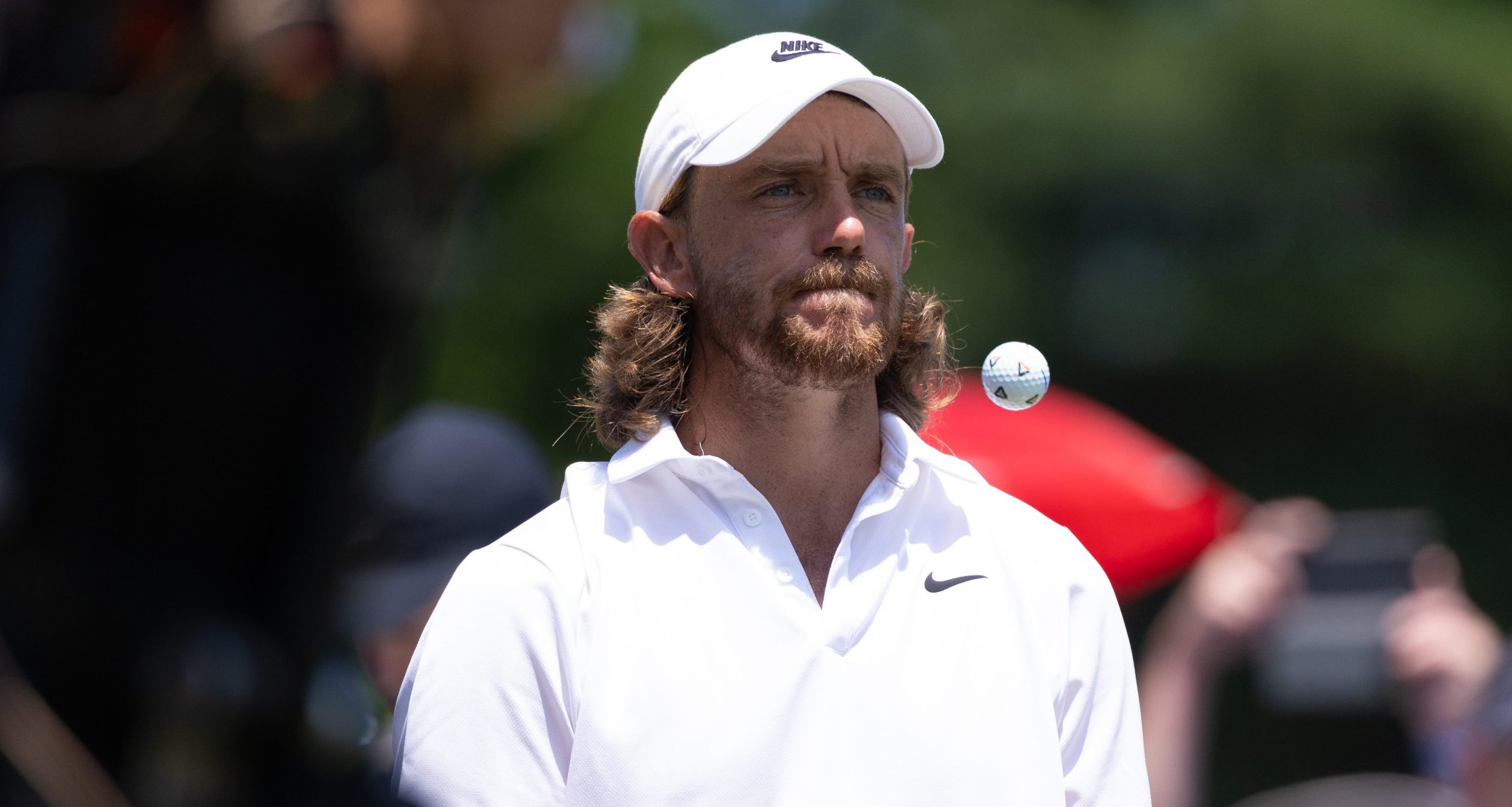 Tommy Fleetwood juggles a ball