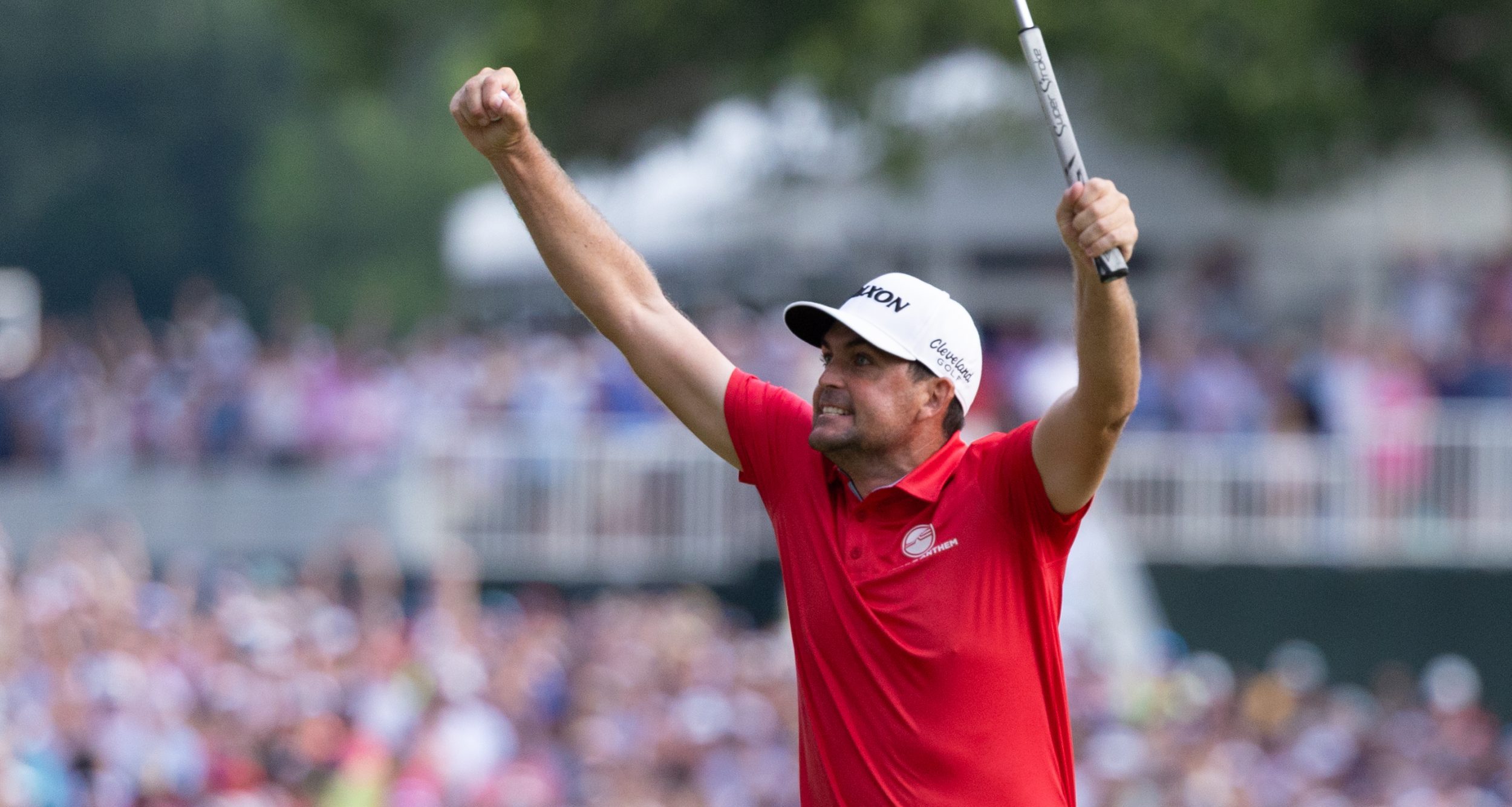 Keegan Bradley reacts after a birdie putt on the 18th hole to win the Travelers Championship