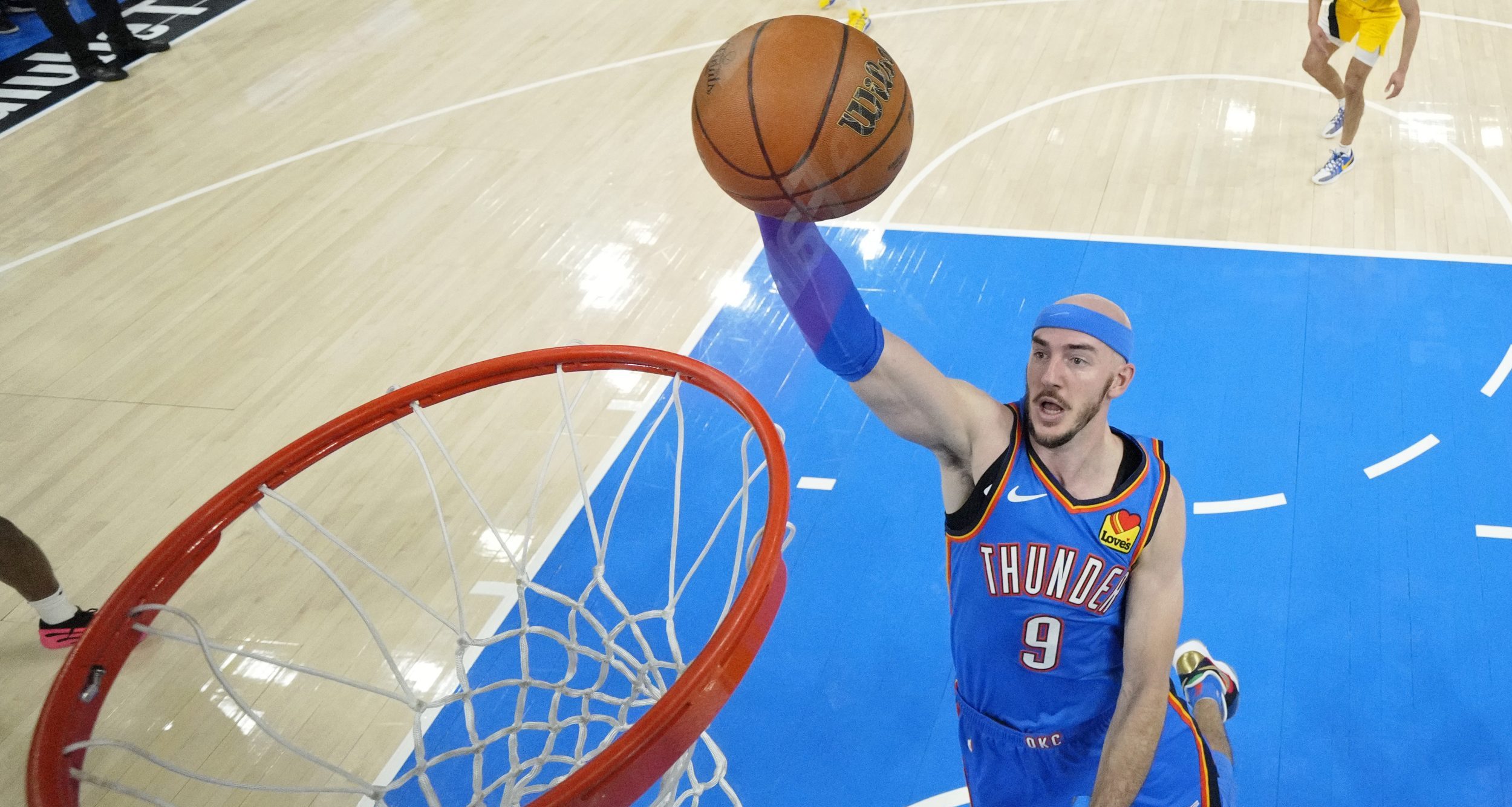 Jun 22, 2025; Oklahoma City, Oklahoma, USA; Oklahoma City Thunder guard Alex Caruso (9) dunks against the Indiana Pacers during the first half of game seven of the 2025 NBA Finals at Paycom Center.