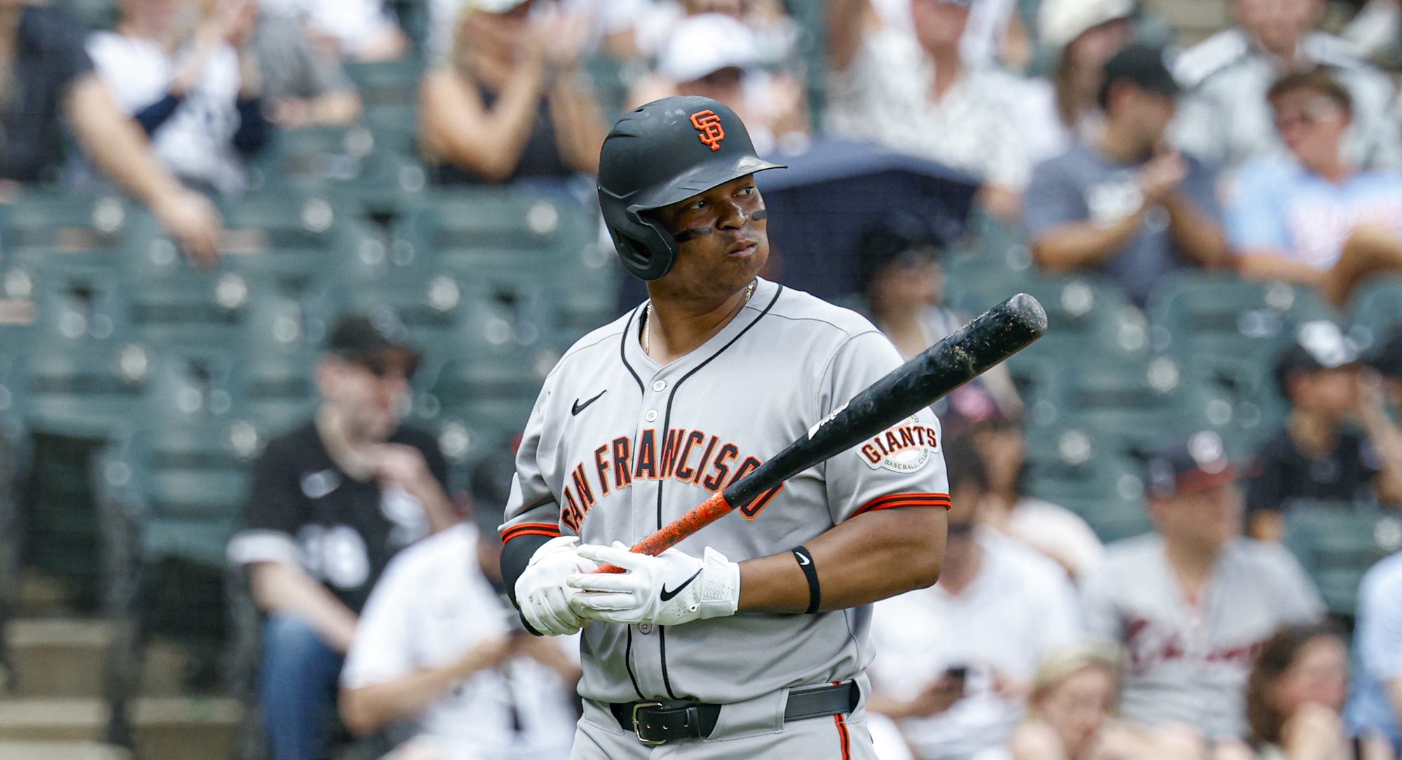 San Francisco Giants designated hitter Rafael Devers (16) reacts after striking out against the Chicago White Sox during the ninth inning at Rate Field.