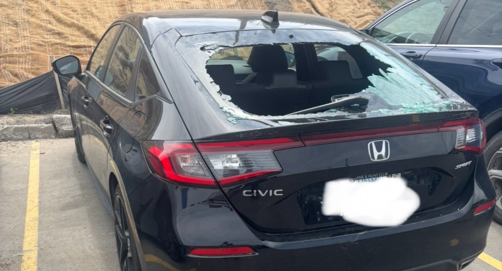 A smashed window on the car of Senators' VP (communications) Ian Mendes.