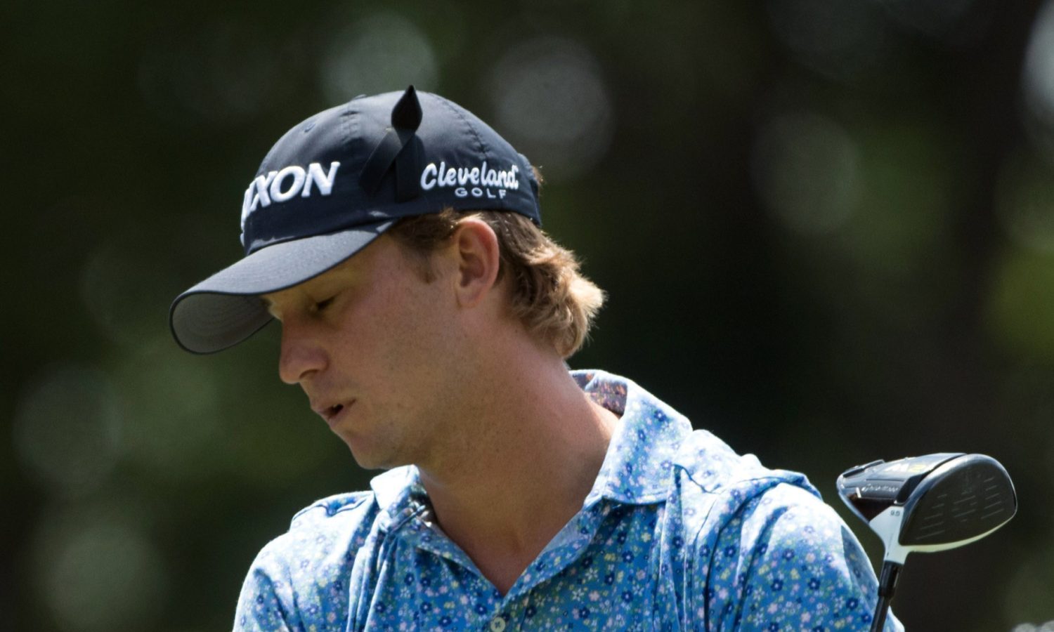 Jun 22, 2018; Cromwell, CT, USA; Smylie Kaufman reacts after his tee shot on the 18th hole during the second round of the Travelers Championship at TPC River Highlands.