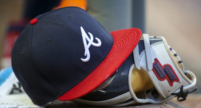 May 31, 2019; Atlanta, GA, USA; Detailed view of hat and glove of Atlanta Braves center fielder Ronald Acuna Jr. (not pictured) against the Detroit Tigers in the fourth inning at SunTrust Park. Mandatory Credit: Brett Davis-USA TODAY Sports