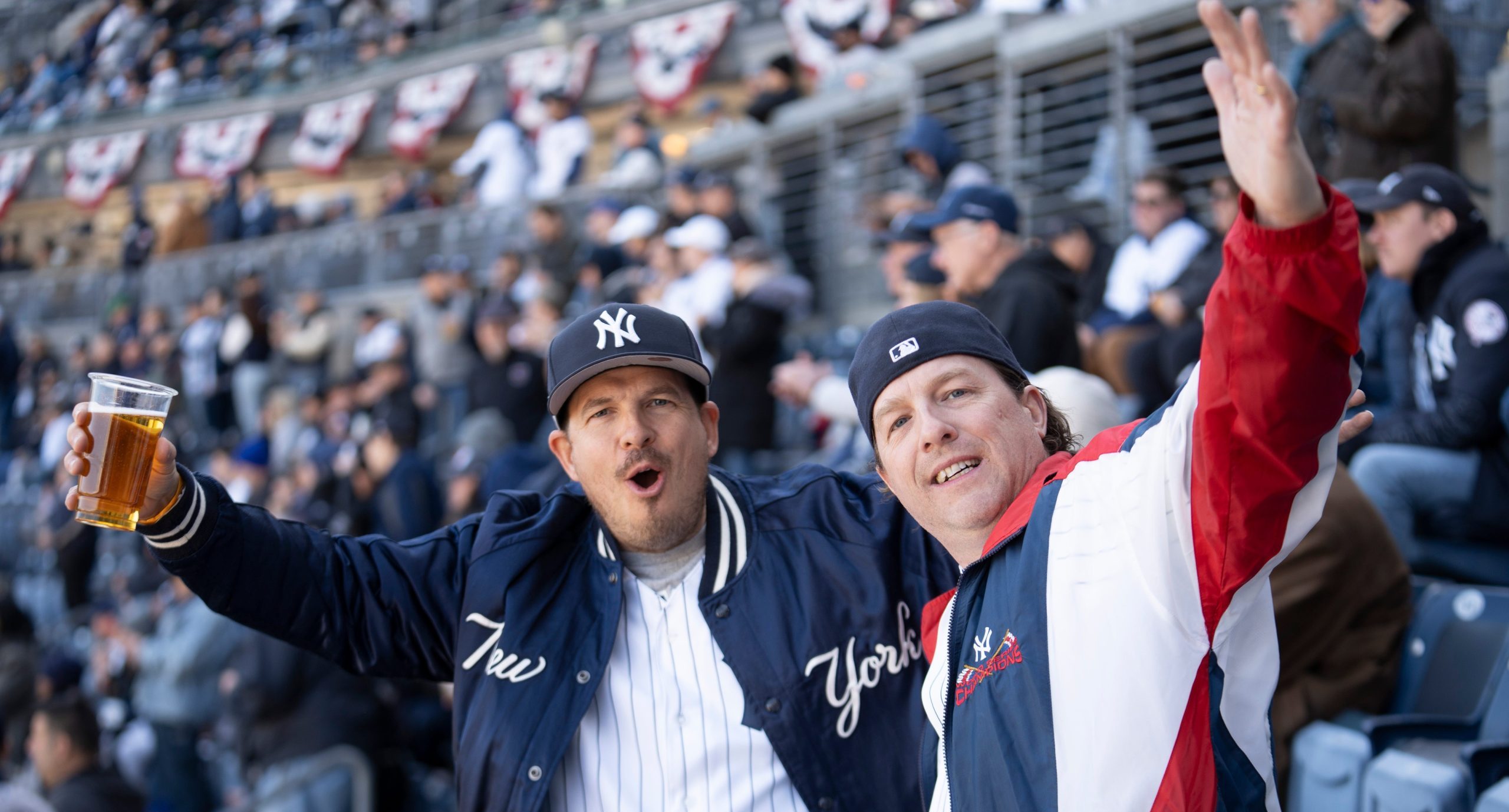 Fans cheer for the camera prior to the start of the opening day game between the NY Yankees and Milwaukee Brewers at Yankee Stadium on Thursday, March 27, 2025.