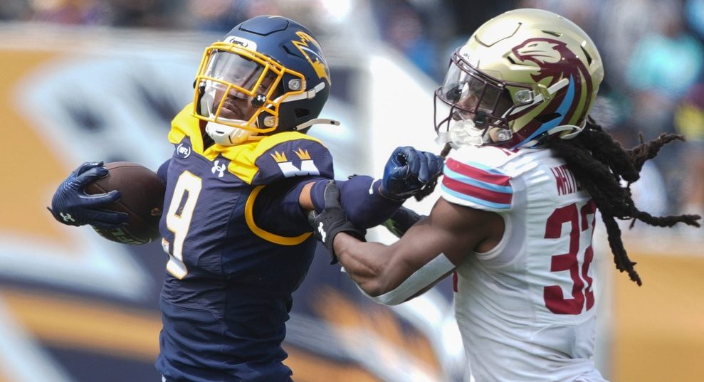 Showboats’ Jonathan Adams (9) stiff arms Panthers’ Kendrick Whitehead (32) as he runs with the ball during the UFL game between the Memphis Showboats and Michigan Panthers at Simmons Bank Liberty Stadium in Memphis, Tenn., on Sunday, March 30, 2025.