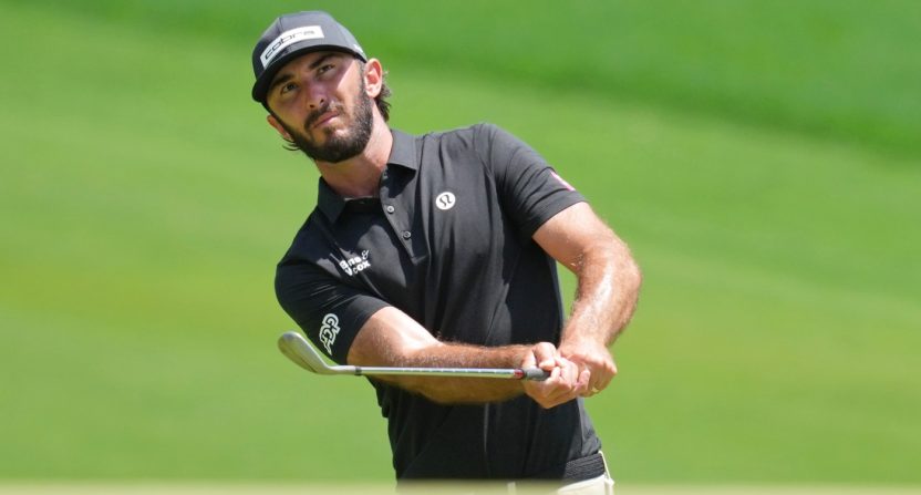 Max Homa takes a shot on the third hole during the third round of the PGA Championship golf tournament at Quail Hollow.