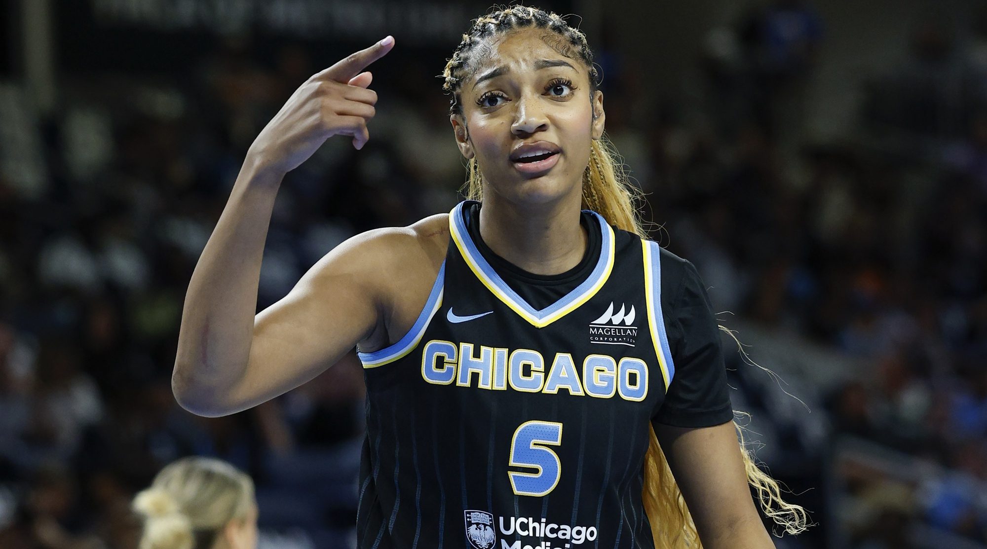 Jul 9, 2025; Chicago, Illinois, USA; Chicago Sky forward Angel Reese (5) reacts during the first half of a WNBA game against the Dallas Wings at Wintrust Arena. Mandatory Credit: Kamil Krzaczynski-Imagn Images