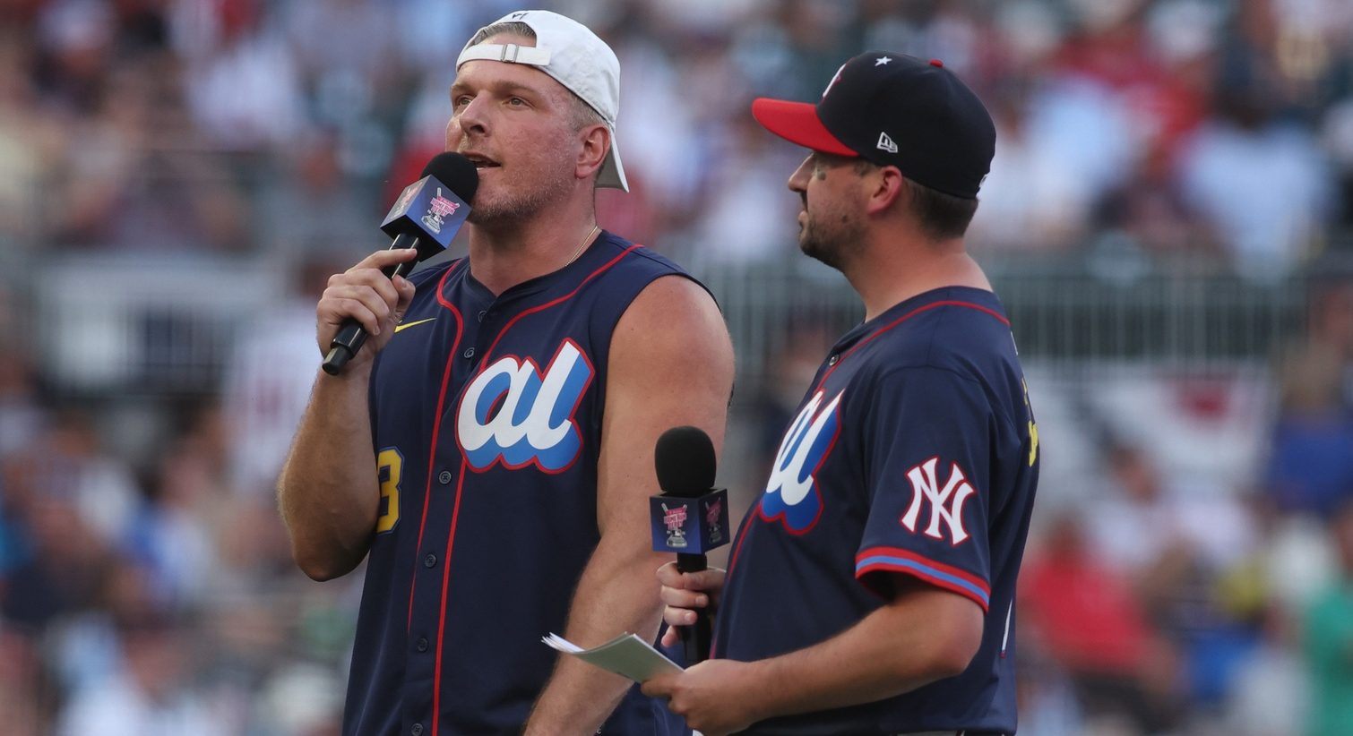 Jul 14, 2025; Atlanta, GA, USA; Pat McAfee and Ty Schmit announce the participants during the 2025 Home Run Derby at Truist Park. Mandatory Credit: Brett Davis-Imagn Images